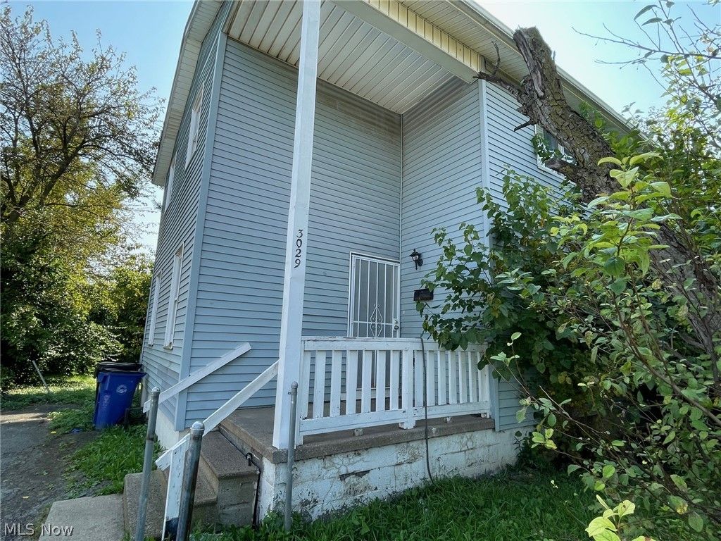 Photo of 3029 E 73rd Street, Cleveland, OH 44104 (MLS # 5203859)