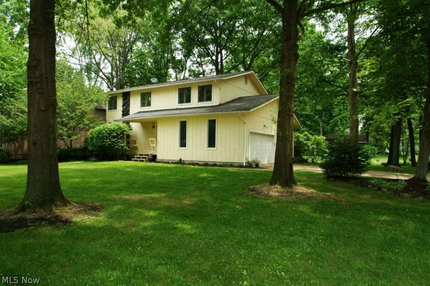 Visit this lovely Fairlawn home located in a very conveniently located neighborhood. This 4 bedroom and 3 bathroom home has been completely updated. The kitchen is completely redecorated with new appliances, cabinets and granite counter tops. Rooms have been painted and carpet has been replaced or bamboo hardwood floors have been installed in the living-room, kitchen, and dining-room. Entertaining will be easy on the main floor with a spacious living room, open to a dining room which is located next to the kitchen and family room. There is a slider off the kitchen that leads to a large screened in deck and backyard. The four bedrooms upstairs are ready for your finishing touches. Each bedroom has a great closet. The master bedroom is 21 x 12 and has a large walk-in closet and full bathroom with a double sink. This home is walking distance to Fort Island Elementary and Park and a swim club. The owner are providing home warranty.