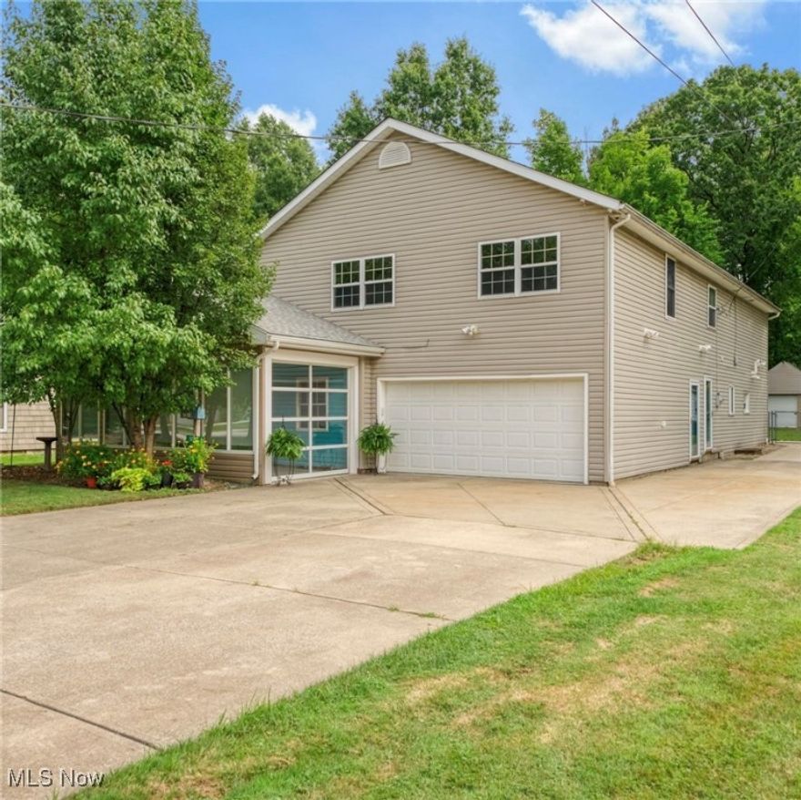 Discover a hidden gem in the heart of Mentor, perfectly situated on a tranquil street. This deceptively spacious residence offers an
impressive 3,495 square feet of living space above grade. Featuring five bedrooms, two conveniently located on the main floor, and three full bathrooms (two upstairs and one on the main floor). This home was designed for comfort and flexibility. It boasts abundant entertaining spaces, seamlessly connecting indoor and outdoor areas, perfect for gatherings regardless of the weather. Enjoy the convenience of choosing laundry hook ups on both the main and second floor. This home is ideal for accommodating a large or multi-generational family or a home business, with options limited only by your imagination. The entire interior was freshly painted in July 2024, new carpet was installed in the two main floor bedrooms along with luxury vinyl flooring in the kitchen, family room and hall in June 2024. A new furnace was installed in 2023 and new hot water tank in 2022. The owners have lovingly cared for this home, and their pride of ownership shows, this home is move in ready. The backyard is fully fenced and includes a large, secure outbuilding at the rear of the property. Don't miss the chance to experience the exceptional features this home offers!