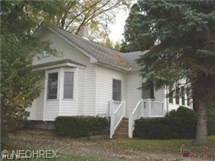 Clean and Spacious Cape Cod with new roof on garage - pole barn (workshop) and house (2014).  Formal living room and dining room with  berber carpet. Eat in kitchen, 1st floor master with full bath. 2nd floor has 2 bedrooms with built-in cabinets and large closets, remodeled bath. Florida Room on front and enclosed patio in back. Basement with lots of storage. Huge garage and work shop. Sellers will install septic at acceptable price. Zoned for small business or shop.
