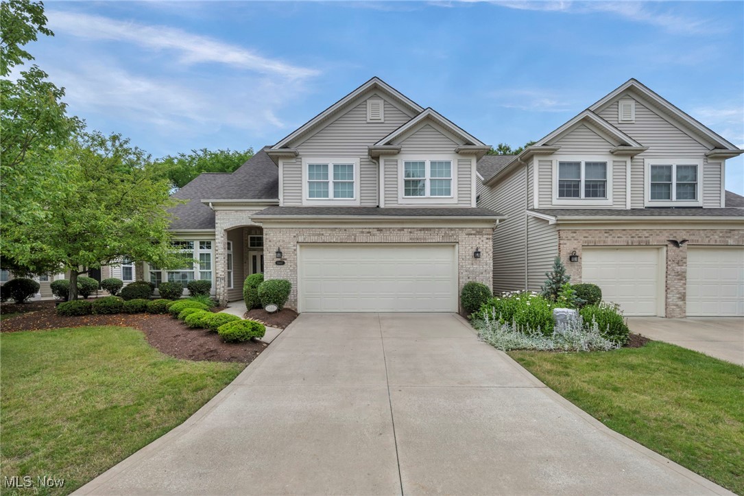 Welcome home to this charming and beautifully maintained 3-bedroom, 2½-bath colonial cluster home in the popular Ashley Oaks Development of Strongsville. With 2,537 square feet of comfortable, move-in ready living space, this home offers a great mix of warmth, style, and functionality. The open layout feels bright and spacious, with high ceilings, hardwood floors in the foyer and kitchen, and a cozy gas fireplace in the Great Room—perfect for relaxing nights or hosting friends. A lovely loft with hardwood floors and built-in bookshelves overlooks the Great Room, adding even more charm and versatility. The kitchen includes all appliances and flows easily into the dining and living areas, making it a great setup for everyday living or entertaining. Off the main living space, the sunroom—with French doors, tile floors, a ceiling fan, and a sliding door to the outdoors—is a perfect spot for reading, morning coffee, or extra lounge space. The spacious primary suite includes its own bathroom and a walk-in closet, offering a private and peaceful retreat. All the bedrooms are carpeted for added comfort. Recent updates include new microwave, garbage disposal, dishwasher, refrigerator, air conditioner, hot water heater, plus a freshly painted front door. This home is truly move-in ready and located in a wonderful community. Don’t miss the chance to see it!
