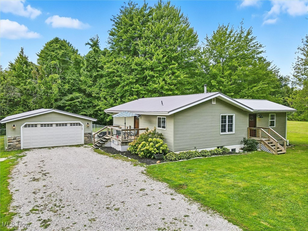 This is the one! Country Chic Hobby Farm on almost 7 acres with a gorgeous pond. Immaculate home with every thing to start your garden or hobby farm. Completely updated. Kitchen has brand new everything including a gorgeous back splash. Bathrooms completely remodeled. Pergo laminate flooring throughout. 16x20 family room addition put on 2024. All new lighting fixtures throughout. New roof on barn in 2021. Leaf guard put on home and barn in 2024. Brand new pond submersible pump installed 2025. New wood burner installed in 2024. Two cements pads poured in back yard in 2024. Three chain linked fences installed for dogs in 2021. New garage doors installed in 2023 on barn and garage. Extra long Garage was divided to create a workshop in the back. Stone drive way in the spring. The barn has electric and both barn and garage have new automatic garage door openers.