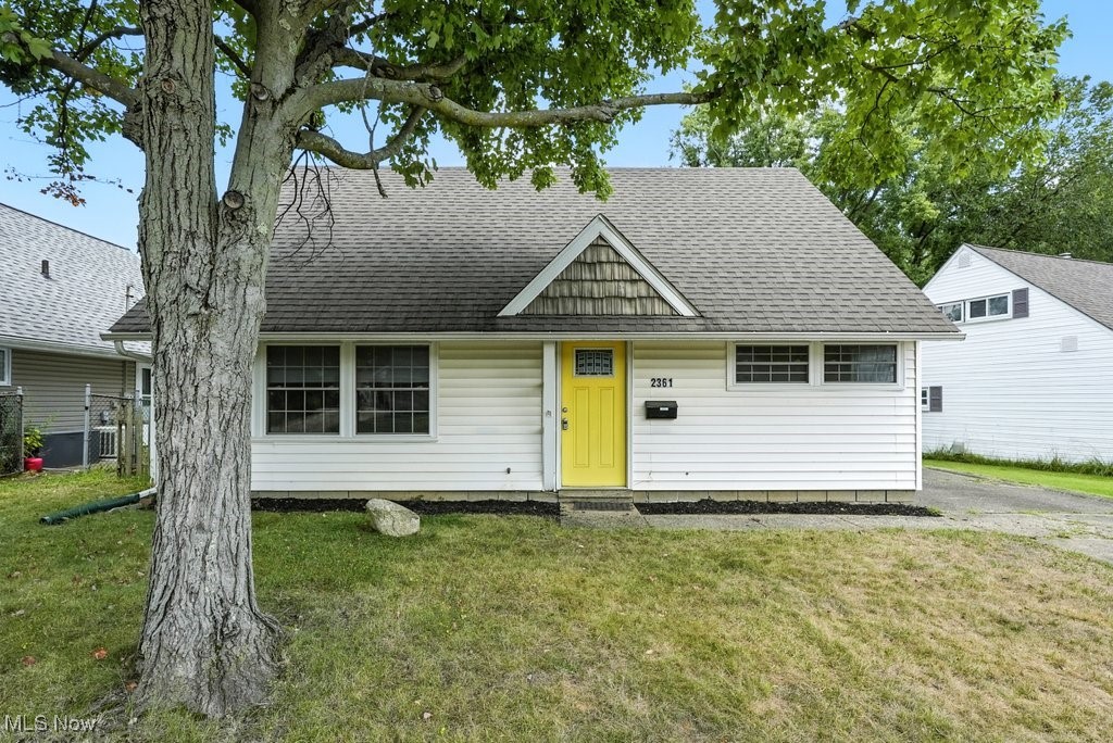Welcome home to this charming Cape Cod located in Cuyahoga Falls. Offering a smart layout with 4 bedrooms, 1 full bath, and a 2-car detached garage, this well-kept home has a fantastic location close to parks and tons of outdoor attractions. Upon entering you're greeted by an open concept living, dining and kitchen area. The area features natural wood-colored floors, white cabinets, fresh paint, a tasteful backsplash and plenty of storage/pantry space. A conveniently located first-floor laundry is just off the back entrance to the home. The first level features two bedrooms and a full bathroom, with a shower/tub combo, while the second floor offers two generously sized bedrooms each with closets and high lofted ceilings for a super spacious feel. Outside you can enjoy a private, yet easily manageable yard; perfect for anyone who wants a little space with not a lot of upkeep. Located close to Waterworks, Float the River, the Hike and Bike trail and many other parks located nearby, this home is ideal for any outdoor lover who still wants the convenience of being close to shopping, dining, and highways. Book your viewing today to see what this home and area has to offer!
