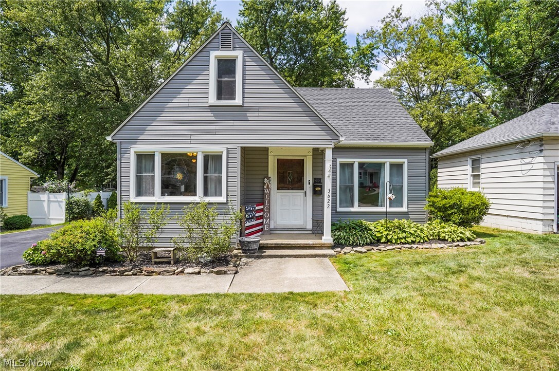 Welcome home to this charming three-bedroom, two full bath cape cod. Come on in from the covered front porch and into the living room offering hardwood floors, large window to let the natural light to shine through and open to the kitchen. Bright, eat in kitchen with beautiful maple cabinets, and large windows, plenty of room for an island. There are two first floor bedrooms. Master bedroom is upstairs with large closets, sitting area which easily could be an office etc. Wonderful, finished lower level offers a family room, or bedroom, and has a bar for entertaining. Laundry, storage area, and waterproofed. One car detached garage. Large, fabulous backyard has a firepit area, shed, and plenty of room to sit out and relax or entertain. Roof (2012), siding, gutters and downspouts (2024). Move in ready!