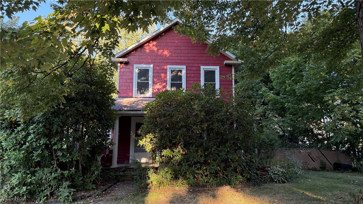 Investor special – built in 1880, this 2-story century home offers 1,405 square feet with 2 bedrooms, 1 full bath, and a bonus room on the second floor that could serve as an office, nursery, or additional living space. Original character is found throughout with hardwood floors in the dining room, parlor, and family room along with classic wood shaker siding that highlights its historic charm. Additional features include a basement providing plenty of storage and a single-car detached garage. The home is in need of significant work and is being sold as-is, making it a strong opportunity for investors, rehabbers, or buyers seeking a personal renovation project. Conveniently located close to downtown Ravenna, shopping, the Portage Bike and Hike Trail, and major interstates, this property provides the right buyer the chance to restore a piece of history while creating future value and functionality.