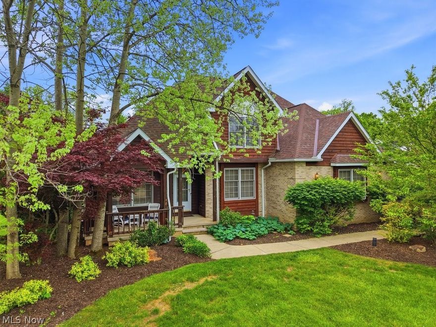Contemporary style home elegance meets everyday comfort in this 4-bedroom, 3-bath home situated on a lush, nearly one-acre lot in a highly desirable and well-regarded HOA community Towpath Park. The inviting first-floor master suite offers convenience and privacy, while the dramatic vaulted-ceiling great room showcases rich hardwood flooring, a wall of windows overlooking the backyard and a stunning two-sided ventless gas fireplace that seamlessly connects to the open-concept kitchen.  3 bedrooms upstairs plus a bonus room with no closet.  In the upper hallway find a desk for an extra study nook!  Truly a unique floorplan.

The updated kitchen features newer quartz countertops and backsplash, creating a modern and sophisticated gathering space. Recent improvements include refrigerator and washer/dryer (2025), dishwasher (2023), furnace (2018), A/C (2017), hot water tank (2015), and patio (2015). Range and microwave (2012). All bathroom countertops were refreshed in 2022.  Don't forget the first floor laundry and mudroom!

Additional highlights include smart home features such as a video doorbell, garage camera, an Ecobee thermostat & a front porch to sit with your rocking chair at the end of a summer day. The expansive unfinished basement offers endless possibilities and is ready for your finishing touches. Enjoy the rare combination of space, style, and functionality on this unique oversized lot in a sought-after neighborhood with an opportunity to make it your own dream home.