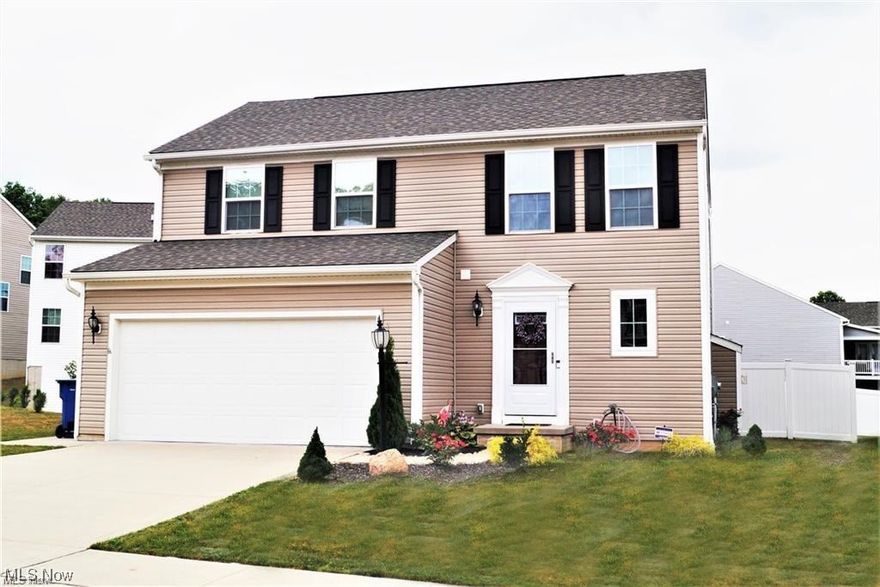 Welcome to 553 Meadow Glen Lane! This newly updated Colonial is located in a quiet development right across the street from the Goodyear Heights Metro Park and close to shopping and restaurants. The home offers generous amounts of natural light, spacious rooms, and an abundance of storage space. The relaxing primary suite is completed with a spacious walk-in closet and a Large bathroom; complete with a jetted tub. Two additional bedrooms, a full bathroom, and a laundry room complete the second floor. Two-car attached garage and large fenced-in back yard. Don't miss the opportunity to make this your new home!