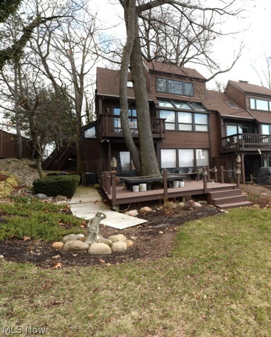 Beautiful private end unit on history Meyers Lake!  This home has everything to offer, spacious living spaces, amazing views and outstanding outdoor spaces.  With it's own private dock this fully furnished, low maintenance single owner condo is a must see!  Immaculate inside this home is ready for the next owner.  Large open living spaces and a whole home speaker system allow for great entertaining areas.  The custom kitchen with stainless appliances and solid surface counters gives amazing prep space.  This unit has 4 decks and boasts an a large master bedroom with on-suite with tons of built ins.  The two fireplaces allow for a cozy place to relax with a fire and a book during the winter months and the summer could be spent outside on the lake.  The third bedroom could be an office or sitting room for the master.  The solid wood built ins provide tons of storage space.  This home is ready to go all you need is to pack a bag, move right in and start enjoying lakefront living!