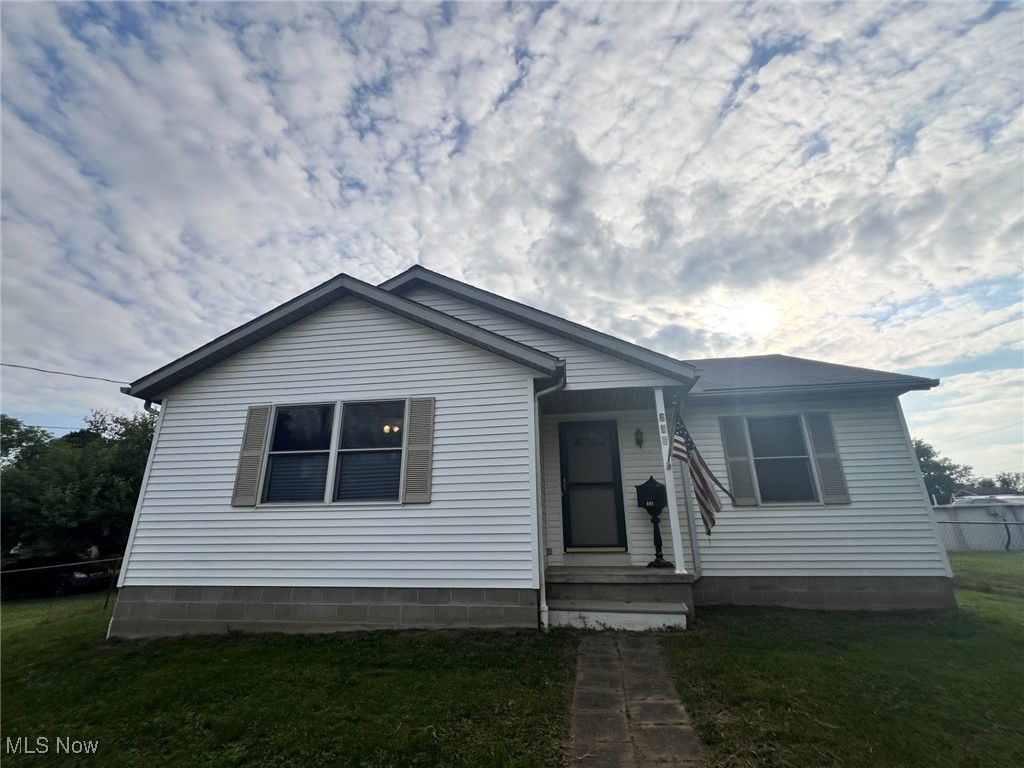 Welcome to 661 Cliff Street NW, a charming 2004-built ranch home set on a generous half-acre in the heart of Massillon. This well-maintained property offers 2 bedrooms, 1 full bath, and a bright, open floor plan that’s perfect for everyday living and entertaining. The spacious oak kitchen with ceramic tile flooring flows seamlessly into the living and dining areas, creating a warm and inviting atmosphere. Retire in the evening to one of the two generously sized bedrooms. Convenience is built in with first-floor laundry and an oversized detached garage—ideal for parking, storage, or a workshop. Downstairs, the full 13 course basement is well on its way to being finished, with rooms already framed and drywalled, providing the perfect opportunity to expand your living space. Outside, enjoy a fenced yard with plenty of room for gardening, play, or simply relaxing in your own private retreat. The large composite deck is ready for your next BBQ! With elevated city views and a location close to parks, shopping, and dining, this home offers comfort, space, and potential all in one.