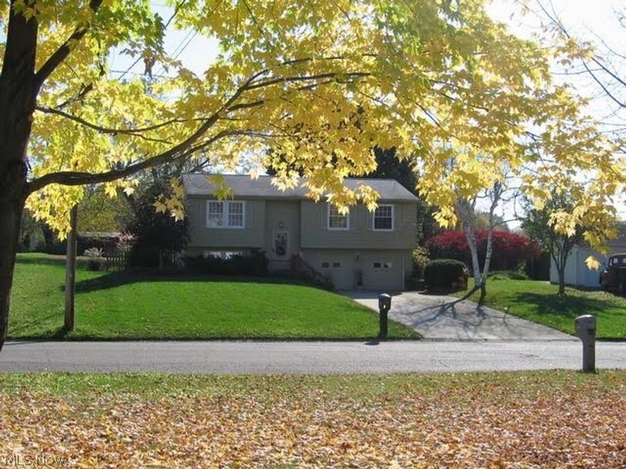 A place to call HOME!  The owner has loved living here, but has decided it is time to downsize.  This 1800 sq. ft. gem has all the space you would want for a growing family.  4 bedrooms, 2 full baths, gorgeous family room addition off the upper level dining area with doors leading to a great wrap around deck.  All the updates have been done.  Newer kitchen , baths, roof, windows, flooring.  Large workshop area in lower level.  Absolutely nothing to do, but move in.  2 lots totaling almost an acre allowing plenty of room for outside activities.  Don't hesitate to view this wonderful home.  Home Warranty for buyer's peace of mind.