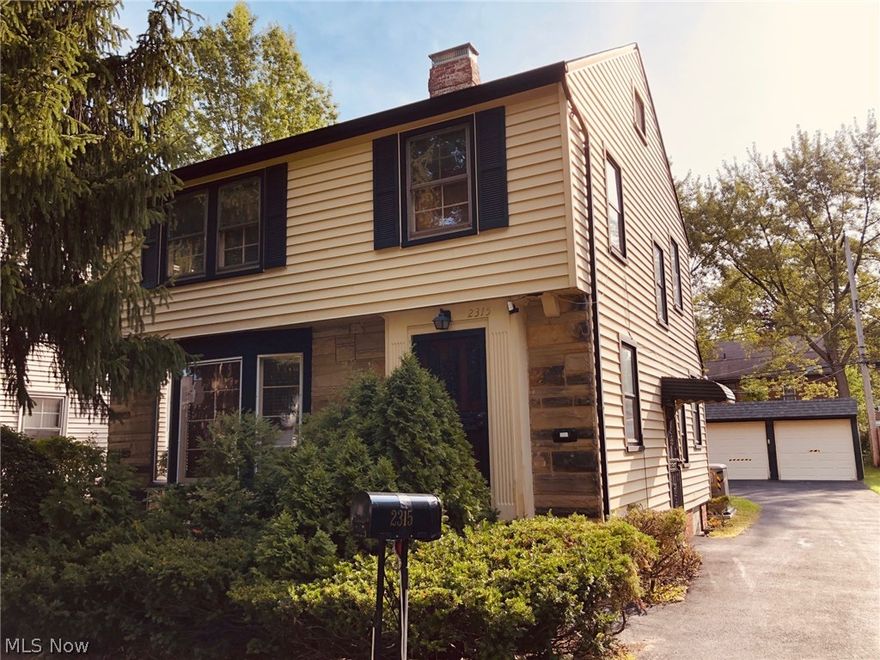 Move-in ready Heights colonial with almost 1500 sq ft of total living area, including the basement rec room. Lovely hardwood floors throughout the huge living room with fireplace, formal dining room, and all 3 bedrooms. Kitchen features an eat-in area, luxury vinyl plank flooring, and includes stainless refrigerator, stove, dishwasher, and microwave. Upstairs are 3 generously sized bedrooms, including the rear bedroom with access to a private balcony. Other features: 1st floor sunroom, walk-up attic, 2-car garage, whole-house generator, central AC, vinyl siding for worry-free maintenance, upgraded electrical, ceiling fans, and cool architectural features such as glass door knobs. Home security features include glass block on all basement windows as well as a four camera surveillance system with TV monitor. Updated technological conveniences include a new Aprilaire wifi thermostat, side door wifi Nest lock to avoid lockouts, garage door key pad to avoid garage lockouts, power failure re