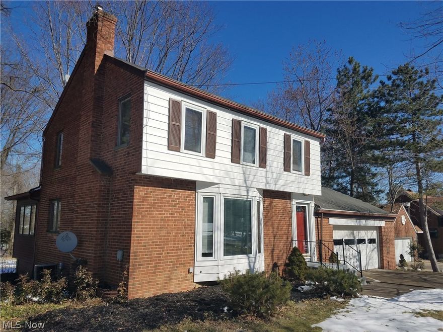 Quality Brick/Alum Colonial on 1.09 Acre Wooded Lot w/ 2 1/2 Att. Gar. and 2 1/2 Detached Gar. * New Kitchen w/ Stainless Appliances, Granite Countertops and Breakfast Bar * Rustic Living Rm. w / Sandstone Wood Burning Fireplace * Charming Open -Beamed Ceiling Family Rm. w/ Private Wooded Views * Lrge. Master Bdrm w / 2 Closets * New Beautiful Ceramic Tile Bath * Walkup Attic Storage * New 1st. Flr. 1/2 Bath * Spacious Basement Rec. Rm. w/ Full Bath* New Furnace* Glass Block Windows * Att. Garage w/Pull -Down Ladder Storage w/ Lights* Private & Quiet,- Wooded Lot w/ additional 2 car Det. Garage/ Storage * Large Sandstone Raised Porch/w outdoor Fireplace that overlooks a Beautiful Natural Setting * Easy -to- Show... Great Area of Fine Homes...