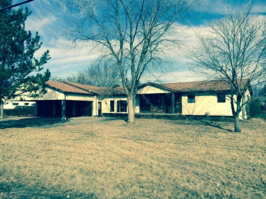 Three bedroom ranch style home that has a large family room with fireplace. Not mention a six car garage with 10ft. doors. This home sits on 3/4 of an acre lot.