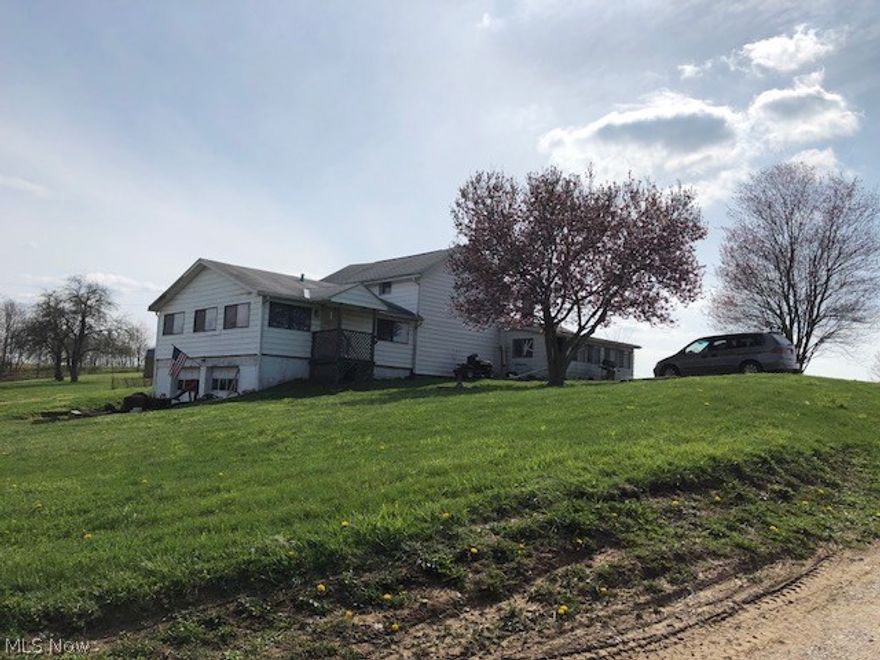 There are two houses on this 2.19 acre parcel.  Tenants have been there for a very long time.  Shared well and septic between the houses.  Large house rents for $725 and small house rents for $450.  Tenant is responsible for all utilities.