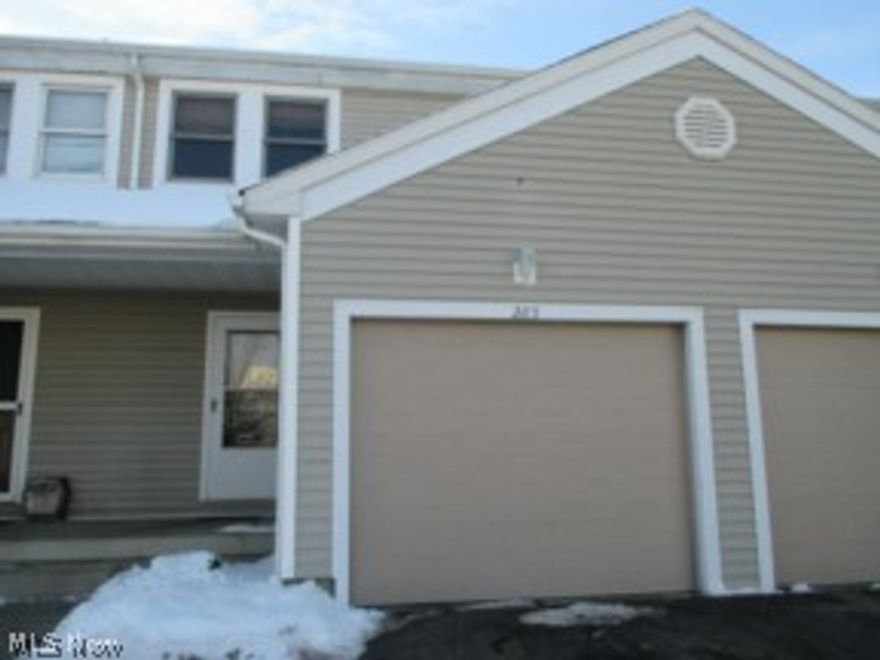 Cozy 2 bedroom condo with an open floor plan on the main floor...fireplace in the living room can be seen and enjoyed even from the kitchen!! Both bedrooms have large closets...first floor laundry and finished basement with Rec room and a half bath.