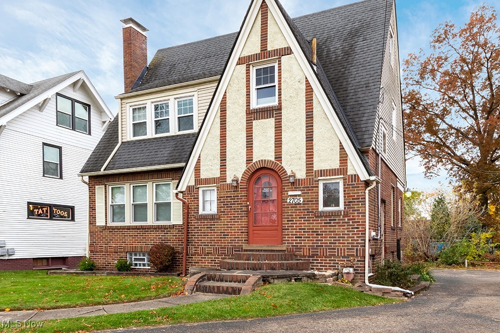 Beautiful Tudor commercial building on Cleveland Ave. This was a home converted so it has a kitchen, 3 bedrooms, 2 bathrooms, living room, formal dining room, and a basement. It was used by a marketing business until they relocated. Walking in the front, there is beautiful hard wood floors that were refinished, a stone fireplace mantle with shelves, and 2 sets of French doors. It has modern lighting, a stove, fridge, and microwave, lots of extra storage and many updates. Basement has a utility sink and glass block windows. There are many different kinds of businesses that could use this space, please call zoning dept for more information.