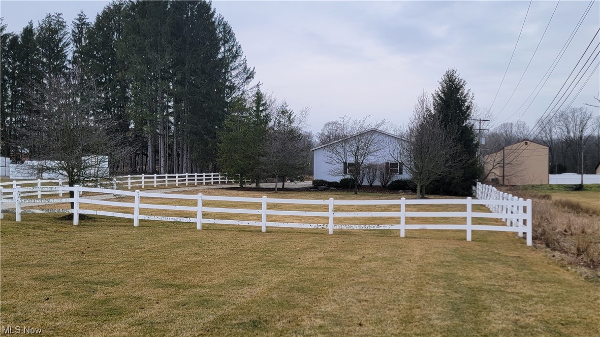 This is the perfect opportunity to operate your business out of! This property is close to all major highways while still being in Sharon Township. The flat property is great to store materials and equipment in with plenty of space to turn large trucks and semis around in. The building is 40' x 60', with a 16' x 10' garage door. It has poured concrete floors and is fully insulated with ceiling mounted heaters. Well water is currently used in the building but city water and sewer is available to tie into.