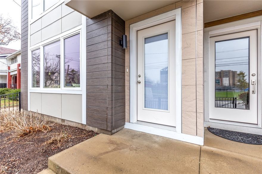 RENT or BUY This custom University Place Townhome is nestled in the heart of Cleveland's robust cultural district, University Circle, a special place on the globe and one of America's Prettiest Neighborhoods recognized by Forbes magazine. Live among world-renowned arts and culture venues and world-class educational institutions in a nationally recognized neighborhood full of convenient amenities, eclectic retail, chic dining and outdoor recreation from Wade Oval through Uptown to historic Little Italy. Enjoy the energy of frontage along E. 118th Street with views of Case Western Reserve University, overlooking right field of Nobby's Ballpark, and University Place's European-style courtyard. Bamboo floors, granite counters, euro style custom kitchen with appliances, roof terrace! Designed to reflect University Circle's traditional gable-roofed homes infused with fresh, cutting-edge style reflecting its world-class institutions, University Place isn't just a living space, it's A Place To