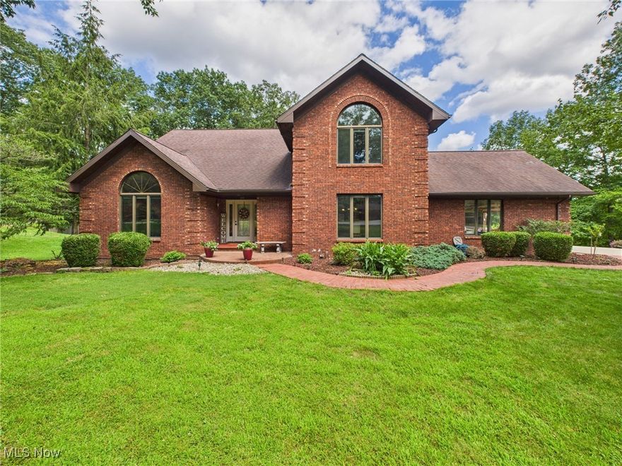 Freshly Updated Brick 1.5-Story on a Serene Acre — Over 5,100 Sq. Ft. of Living Space!

Temporarily off the market to receive a beautiful refresh, this impressive brick 1.5-story home is back and better than ever — with fresh interior paint, brand-new carpet, and a sprawling 5,100+ sq. ft. of living space. Perfectly positioned on a lush, landscaped acre at the end of a peaceful cul-de-sac, this property blends privacy, comfort, and versatility just minutes from town.

The main level features a primary suite retreat with vaulted ceilings, skylights, private screened-in porch and deck access, and a spa-like bath with jetted tub, open shower, and huge walk-in closet. The inviting living room centers around a dramatic fireplace and open stairwell leading to a loft area with three generously sized bedrooms — two sharing a Jack-and-Jill bath with separate sink lobby for added convenience.

This home’s multi-generational potential shines with two full kitchens — one on the main level and another in the finished lower level — plus laundry facilities on both levels. The walk-out lower level also offers a spacious family room, full bath, and your own private sauna.

Fresh, move-in ready, and thoughtfully designed, this home delivers the space and flexibility you’ve been searching for. Whether you’re hosting large gatherings, accommodating extended family, or simply enjoying the peaceful surroundings, this is a property that truly has it all.

All measurements are approximate.
