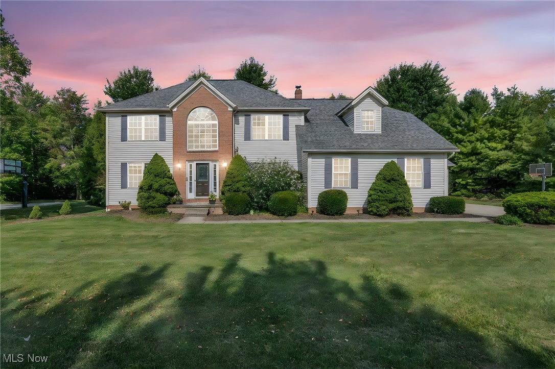 Welcome to The Preserves of Solon, one of the city’s most sought-after neighborhoods, known for tree-lined streets, spacious lots, and a true sense of privacy. This timeless center-hall colonial is on the market for the first time. One-family owned, well maintained, and filled with natural light, it carries loads of memories and is ready for new owners.
Step into the two-story foyer with an elegant staircase as its centerpiece. To the right, a den perfect for today’s work-from-home lifestyle or reading nook. To the left, a formal living room for entertaining or quiet gatherings. Flowing from the foyer U-shaped kitchen with breakfast bar and nook is functional and inviting, perfect for coffee or weeknight dinners. a formal dining room for holidays and special occasions. From the kitchen, step into the grand family room, anchored by a gas fireplace and a vaulted ceiling. Walls of windows bathe the space in natural light, creating an open, airy atmosphere. Just outside, the brand-new Trex deck extends living outdoors, overlooking the landscaped, flat backyard, perfect for barbecues, play, or peaceful evenings.
Upstairs, the owner’s suite offers dual walk-in closets, extra storage, and a beautifully updated en suite bath. Three additional bedrooms complete the level, one with a private full bath, the others sharing a stylish main bath.
The finished lower level adds the 5th full bedroom, bath, recreation area, fitness space, and kitchenette, ideal as an in-law suite, guest retreat, or entertainment zone
And finally, the rare find, a true four-car garage with room for vehicles, hobbies, and storage.
With 4,786 sq. ft. of living space. 5 bedrooms, and 4.5 baths, this home blends classic design with modern updates. The Preserves offers more than just beautiful homes, with low annual HOA fees and direct walking trails to the park, library, and schools, plus the top-rated Solon School District, known for award-winning academics.