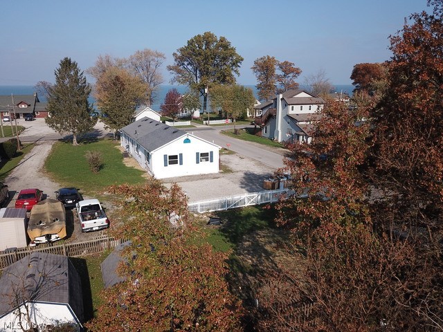 Come see this beautiful renovated ranch home located in the heart of picturesque Vermilion On The Lake just East of the Lighthouse. Enjoy gorgeous views of Lake Erie from the comfort of your living room, deck, & front entry sunroom. This 3-5 bedroom home offers an open layout, huge master suite w/ two separate closets, two wonderfully finished bathrooms, & ample natural light throughout. The impeccably renovated kitchen boasts custom granite countertops, under mount stainless steel sink with chef faucet, new mocha cabinetry w/ beautiful hardware, brand new stainless steel appliances including a stainless steel hood vent, dishwasher, gas stove/oven & side by side refrigerator! Two full bathrooms w/ granite countertops, under mount sinks, beautiful hardware & faucets w/ tilt mirrors & great lighting! One of the bathrooms is an en suite to the Master Bedroom! With new wood look vinyl flooring throughout the main floor, brand new windows and doors, light fixtures, fresh paint in designer c