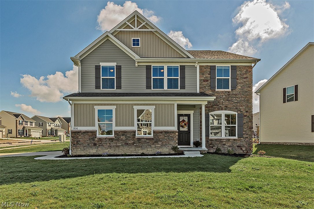 Striking newer construction colonial in Aurora!