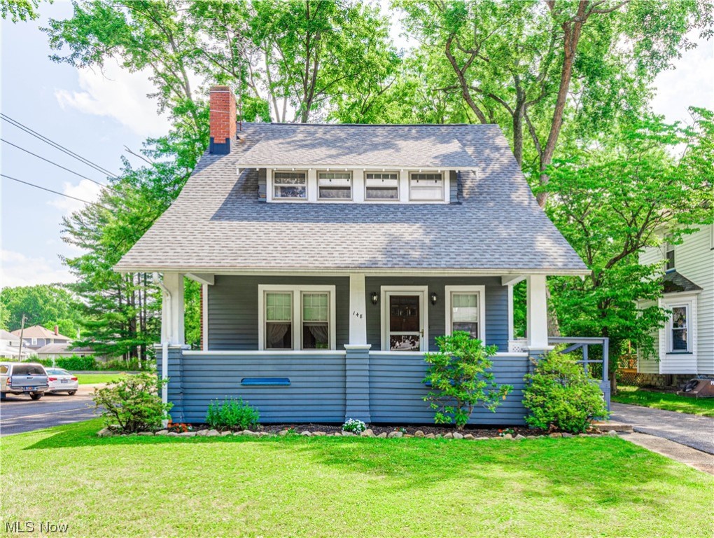 Motivated Seller ! Charming Century home situated in the lovely historic district of Ravenna surrounded by other well maintained homes within a short walk to downtown. Welcoming front porch, formal living room with fireplace, formal dining room, eat in kitchen and a first floor master bedroom and beautiful master bath! French doors from the master lead out onto a deck porch. Upstairs has two more bedrooms and a nicely remodeled second full bath. One of the upstairs bedrooms is extra large. Plus there is a staircase to the open and spacious attic area. There is also a full basement and 2 car detached garage. The hot water radiant heat keeps the house warm and cozy in the winter. Nice yard, great location!