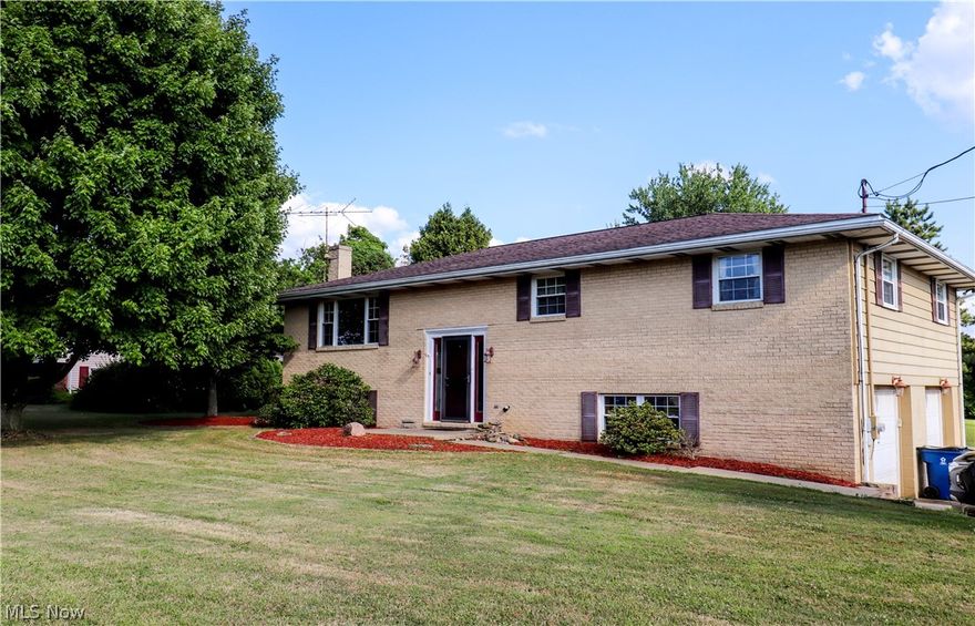 Are you looking for a 4 bedroom, 2 1/2 bath, 2 car attached garage on the out skirts of Lisbon. This raised ranch with a finished basement has everything you  need. Did I mention it sits on an acre lot in a fantastic neighborhood. It also has an extension for an R.V to sit with 220amp ready to go.  Large Master bedroom with a half bath. 2 other bedrooms on main floor with first floor laundry for your convenience. Laminate floors in all bedrooms and living areas. Open living room, dining room, Opens to covered patio(12x14) with newer French Doors. Ikea kitchen with solid Silestone counters and eating bar with beautiful hardwood floor. Basement has a large family room, and another room that can be used as an office or bedroom. The view from the back yard is beautiful over looking the rolling hills. New roof in 2007, Vinyl windows throughout. New flooring 2021. Located on a quiet street close to Lisbon Softball-Baseball fields. Location is ideal as it is within 12 minutes of Salem, Columb