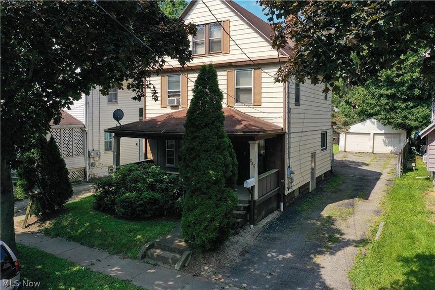 826 Chalker St Akron Ohio 44310 is great for you if you have a larger family or need more rooms for special needs at an affordable price! Located in the  highly sought North Hill area of Akron off of E. Cuyahoga Falls Ave, this home has three floors with a total of 5 bedrooms......yes FIVE Bedrooms or use as Home Office or Hobby Rooms. There are two adequate sized bedrooms on the third floor & three bedrooms on the second floor. There are 2 bathrooms, full bath located on the 2nd floor & full bath w/ shower on the 1st floor. The covered front porch welcomes you & makes a great place for enjoying the nice weather or talking with neighbors while the back porch is more private for backyard relaxation or entertainment & has a great view of your fenced in yard! You can play games or grill in the rear yard area and there is even a detached two car garage with newer siding, the doube garage is a rarity. The full basement is partially finished and has plenty of room for laundry area and storag