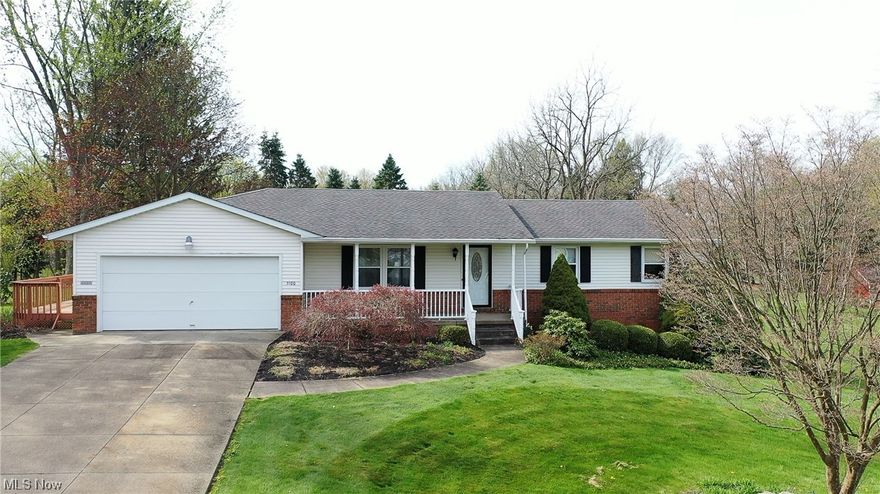 GREAT LOCATION for this Pristine ranch with three bedrooms, two bathrooms, and a 2-car garage home in Springfield, Twp.! A welcoming front porch invites you into the spacious living room with plenty of natural light and is open to the dining area. The centrally located eat-in kitchen offers appliances, a breakfast bar, tile flooring, chair rails in the dinette area, and easy garage access. Off the kitchen is the family room with a cozy stone surround fireplace and sliders to the large covered L shape deck, perfect for entertaining and enjoying the beautiful private backyard, which offers a nice 12 x 10 shed for extra storage. The master bedroom has a private bath with a walk-in shower. The basement is clean and dry, with a laundry area, and could easily be transformed into a living space. Updates include replaced roof, water softener, double hung windows, furnace & AC, exterior front doors replaced, and vinyl railings installed on the front porch. Make this charming house your home! An