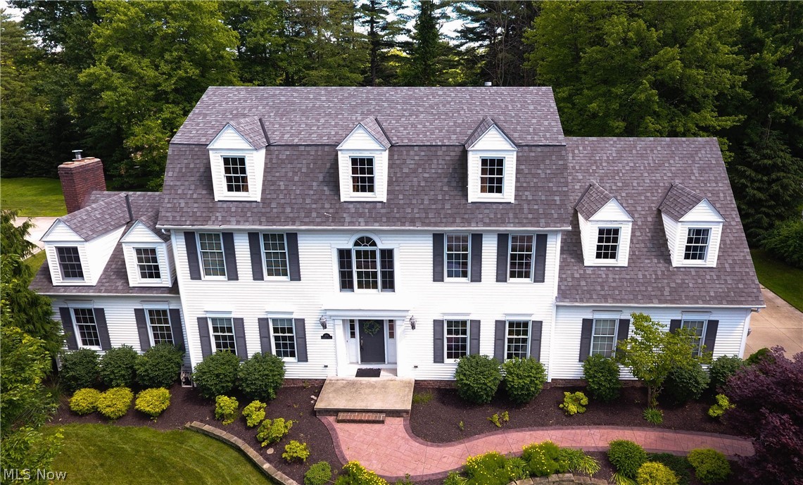 This one of a kind colonial home is centrally located near Hudson Square, Ohio Turnpike, Route 8 highway and community amenities like Lake Forest Country Club. Recently renovated, this well cared for home has it all, with new granite and stainless steel appliances in the kitchen, granite and ceramic tile in all bathrooms, newly tiled shower in master bath, refurbished hardwood floors & new carpeting throughout, wrought iron spindles, stamped concrete patio, large fire-pit entertaining area, complete tear-off new roof…the list goes on and on! Large windows throughout the house allow natural sunlight to shine into the rooms of this 4 bedroom, 5 bathroom home. Unique features include a breathtaking two-story grand foyer, cherry hardwood throughout, chef's kitchen with custom eat-in center island, beverage bar and casual dining area. Spend your morning in the all-season sunroom with vaulted ceilings and large windows overlooking your beautiful, private backyard and patio. The enormous fini