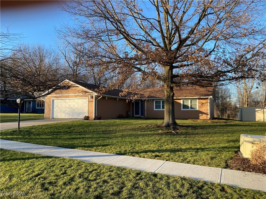 Newly renovated, charming ranch with an open great room floorplan in a quiet family neighborhood in the heart of Strongsville! Convenient location, close to shopping mall, restaurants, I-71 & Ohio turnpike and the Metroparks! You'll also love the private backyard backing up to the wooded neighborhood common area with no neighbors behind! Many updates in and out, 2022 – complete interior renovation: new kitchen, including cabinets, countertops, refrigerator, dishwasher, and disposal; new bathrooms, including cabinets, faucet, toilet, shower/tub, and mirror; expanded master bathroom; new interior doors and molding throughout; new flooring throughout; new light fixtures, outlets and switches throughout; and freshly painted walls throughout! 2023 – full roof replacement, installed composite deck and installed privacy fence, replaced dishwasher, hot water tank, and sidewalk! Exterior renovations include new windows, front door and back door, new garage door and opener, and freshly painted exterior trim and gutters! All this plus a 1 year home warranty is provided! Start the New Year right, hurry to see this absolute jem!