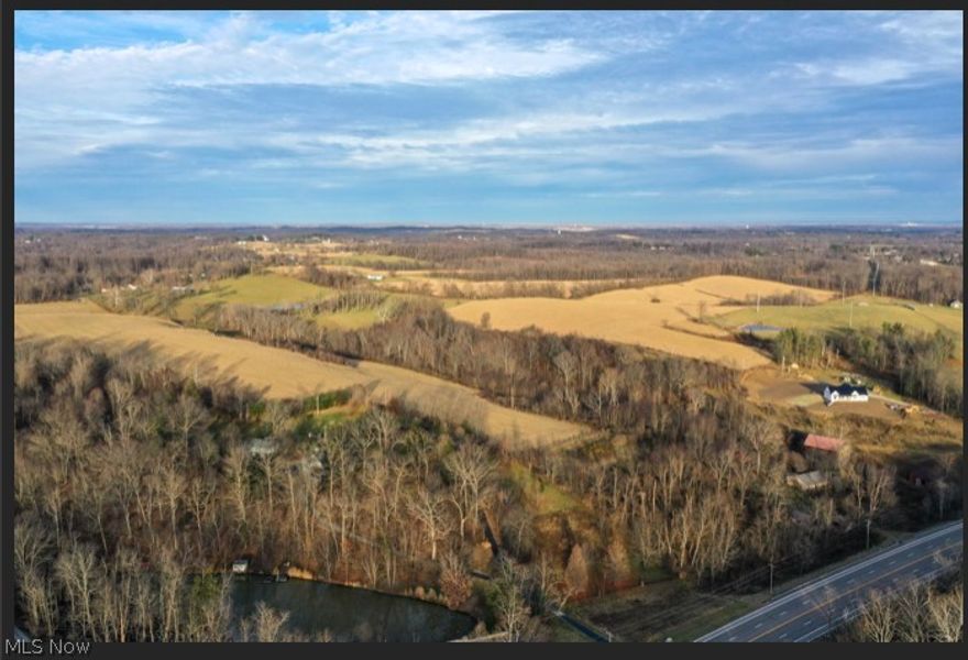 Large Track ( 98.04 Acres )with Frontage ( 825 Feet) on US 40, 5 Miles West of Zanesville, and in addition ( 811
Feet ) of Frontage on County Road 93, Known as Sand Ridge 50 Minutes from Columbus, 40 Minutes From the Intel Site,
with Approximately 75 Acres of cleared Crop Land and 23 Acres of Wooded Area, One of the Largest Tracts available with
Such a Convenient Locations Along US 40, Currently NOT Zoned in Howell Township, Muskingum County. Narural Gas,
Public Water, Are Available, Public Sewer is on Down th Hill