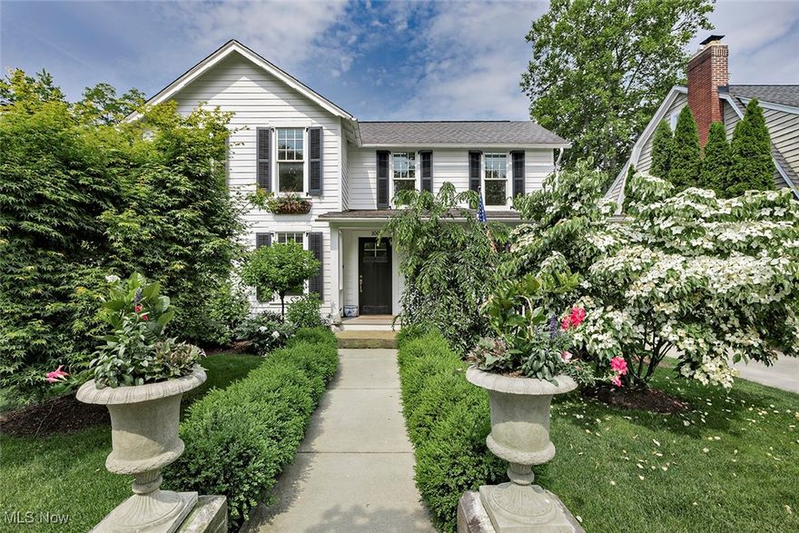Great opportunity with this beautifully renovated & restored 4 Bedroom Century Home which will impress with high quality and architectural character. Located in the heart of Chagrin Falls historic district, this 1904 gem retains the best of historic aspects, while offering modern features. Welcome home as you enter from your charming front porch and into the Foyer area which is open to the lovely Living Room and Dining Room area with abundant natural lighting and a gorgeous dramatic fireplace & chimney added in 2020. This home is perfect for entertaining with the open layout and totally renovated kitchen where you will find plenty of counters and cabinet space, island with stools, recessed lighting, stone counters, designer backsplash and Viking appliances. Continue into the 2020 renovated open bar area with heated floors and added spacious lovely powder room. You will love the grand great room wonderful addition with spectacular views of the backyard. Refinished and some recently added beautiful hardwood floors and designer lighting featured throughout the home. On the second floor you will find a lovely primary bedroom with a stunning bath w walk in shower, heated floors and plenty of walk-in closet space. The three-remaining generous-sized bedrooms offer spacious closets and a hall full bath with tub/shower. The basement has a finished recreation room, laundry area and walk out access to the outside deck area! Many other updates include 2025 new AC, 2025 washer and dryer 2019  hot water tank, Smart home lighting system (Lutron) smart thermostats/smoke detectors, newer windows, floors, roof, plumbing, electric and zoned HVAC.  Exterior features professional landscaping, relaxing front porch, 2020 added chimney, retractable motorized awning over the rear deck, invisible fence and much more! A couple blocks to Downtown Chagrin with shops, restaurants,  riverfront park, library and the falls. Excellent Chagrin Falls Schools. One of the prettiest homes in the Village!