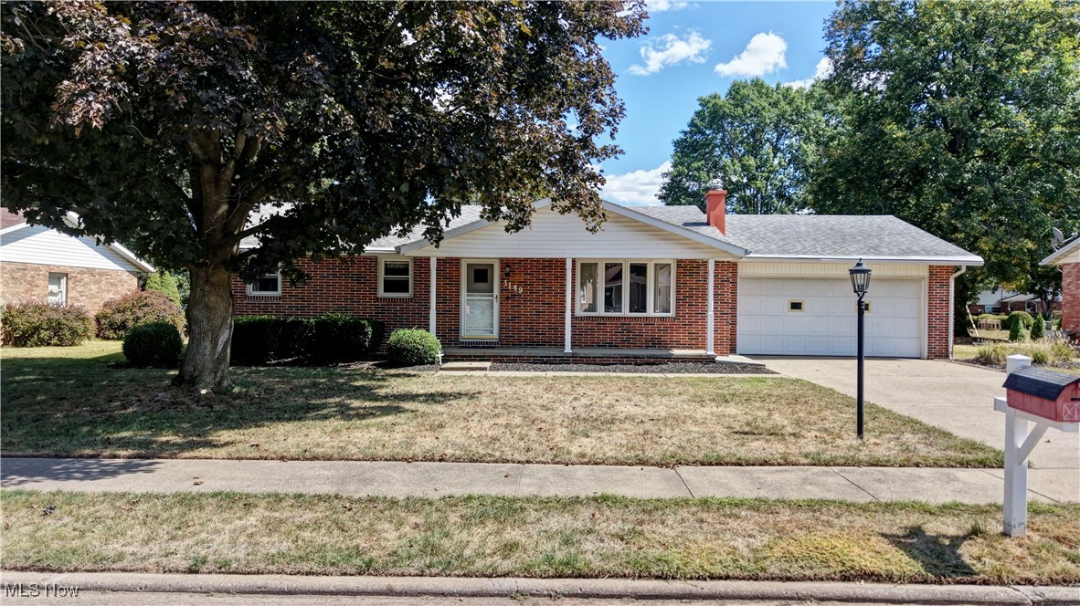 Welcome to 1149 Jefferson Street on the south side of New Philadelphia! This inviting ranch offers 3 bedrooms, 1.5 baths, and 1,408 sq ft of comfortable living space on a full basement. The main level features a bright living area and functional layout, while the finished basement adds valuable space for recreation, hobbies, or a home office. Relax by the propane fireplace, sip your morning coffee on the front porch, or unwind in the enclosed patio overlooking the partially fenced yard. Additional highlights include affordable community pool access for just $75 per year, providing summertime fun close to home. A charming home in a convenient location.