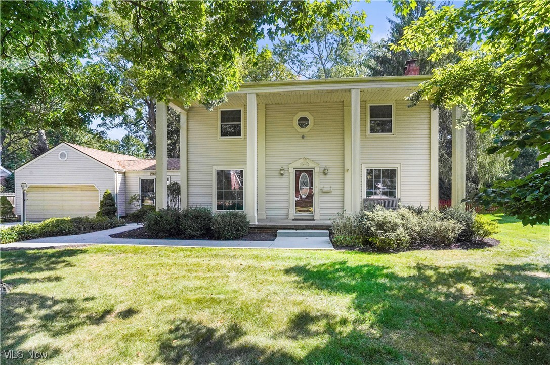 This grand Southern Colonial situated in Silver Lake Estates is truly a pleasant surprise. The impressive 37 ft wide front porch with 2 story high columns creates instant curb appeal and charm. At first glance into the formal living room with fireplace and the formal dining room or den, you will find generous sized rooms that are expansive and open and filled with natural light. The gleaming hardwood floors are beautiful throughout. The eat in kitchen with an extra dining area or den is huge and it has two sliders that lead to a nice outdoor patio and the large backyard that is fenced and semi private. The first floor also includes a bonus room, a full bath, a first floor laundry and an enclosed breezeway that opens to the two car garage. Upstairs you'll find that years ago this home was expanded at one time with an addition making it a 6 bedroom, 3 full bath home. The basement has a rec room with a second fireplace and separate unfinished side. The oversized concrete drive allows for plenty of parking. Updates since '07 include 2 furnaces, the roof and concrete surfaces. Located in close proximity to the schools and to the Silver Lake boathouse, beach and picnic area where residents enjoy swimming, boating and fishing privileges. There's also a lovely park area behind Silver Lake City Hall that is adjacent to the Cuyahoga River and offers a kayak/canoe launch, picnic shelter, baseball field, playground, tennis and basketball courts and the hike and bike trail! Contact me today to see this lovely home and community!