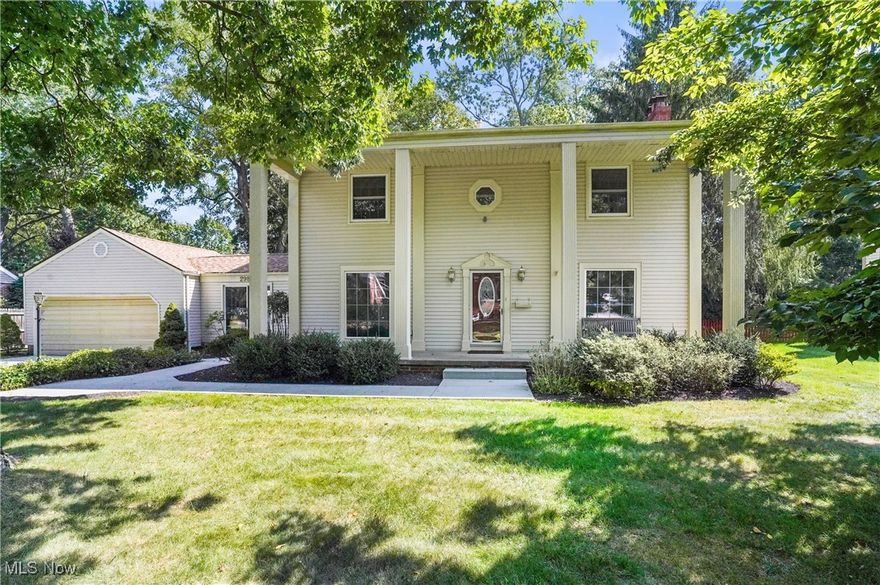 This grand Southern Colonial  situated in Silver Lake Estates is truly a pleasant surprise. The impressive 37 ft wide front porch with 2 story high columns creates instant curb appeal and charm. At first glance into the formal living room with fireplace and the formal dining room or den, you will find generous sized rooms that are expansive and open and filled with natural light. The gleaming hardwood floors are beautiful throughout. The eat in kitchen with an extra dining area or den  is huge and it has two sliders that lead to a nice outdoor patio and the large backyard that is fenced and semi private. The first floor also includes a bonus room, a full bath, a first floor laundry and an enclosed breezeway that opens to the two  car garage. Upstairs you'll find that years ago this home was expanded at one time with an addition making it a 6 bedroom, 3 full bath home. The basement has a rec room with a second fireplace and separate unfinished side. The oversized concrete drive allows for plenty of parking. Updates since '07  include 2 furnaces, the roof and concrete surfaces. Located in close proximity to the schools and to the Silver Lake boathouse, beach and picnic area where residents enjoy swimming, boating and fishing privileges. There's also a lovely park area behind Silver Lake City Hall that is adjacent to the Cuyahoga River and offers a kayak/canoe launch, picnic shelter, baseball field, playground, tennis and basketball courts and the hike and bike trail! Contact me today to see this lovely home and community!