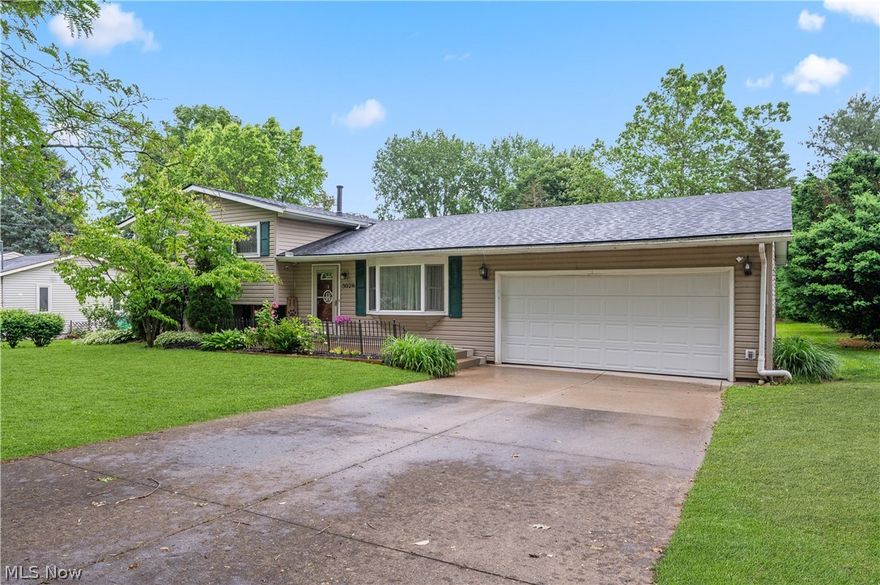Welcome home to this beautiful split-level in Perry, set on nearly half an acre with a brand new roof installed in May 2024! As you step inside, you'll be greeted by the new LifeProof scratch-resistant flooring (2024) and light neutral paint colors, creating a bright and inviting atmosphere. The living room flows seamlessly into the dining room and kitchen, perfect for entertaining and everyday living. The lower level features a cozy family room, ideal for movie nights, along with a convenient laundry area and half bath. Upstairs, you'll find three generously sized bedrooms and a full bathroom. The outdoor space is equally impressive, with a spacious deck complete with a grill and an umbrella for hot summer days. Recent updates include garage doors (2022), a shed (2022), a sliding door (2021), a hot water tank (October 2023), toilets (2021), bedroom doors, a fridge, and a dishwasher (2021), and the brand new roof and scratch-resistant flooring in 2024. This move-in-ready home offers modern amenities and plenty of space, both inside and out. Don't miss the chance to make it your own!