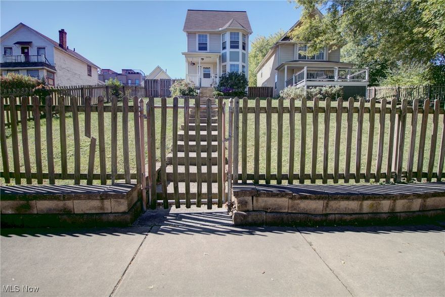 Come home to this beautifully updated colonial on W 7th street in the heart of Tremont where you'll be within walking distance to the shops, restaurants and bars nearby. With a rear entrance from a private street where your 2-car garage and patio/deck with entry to your mud area/kitchen, you'll have "the house on the hill" without the climb up!  The kitchen has plenty of countertop space and stainless steel appliances, especially great for the chef, and there are 3 bedrooms upstairs, two of which fit king-size beds. You'll have a separate living and family room, a bathroom on all 3 levels and plenty of storage and natural light. The yardwork is taken care of here, as well.  The house is in proximity to all major highways, and steps away from the new towpath. If you want to have a home and yard to yourself with no lawn maintenance and enjoy the urban lifestyle, this is it!