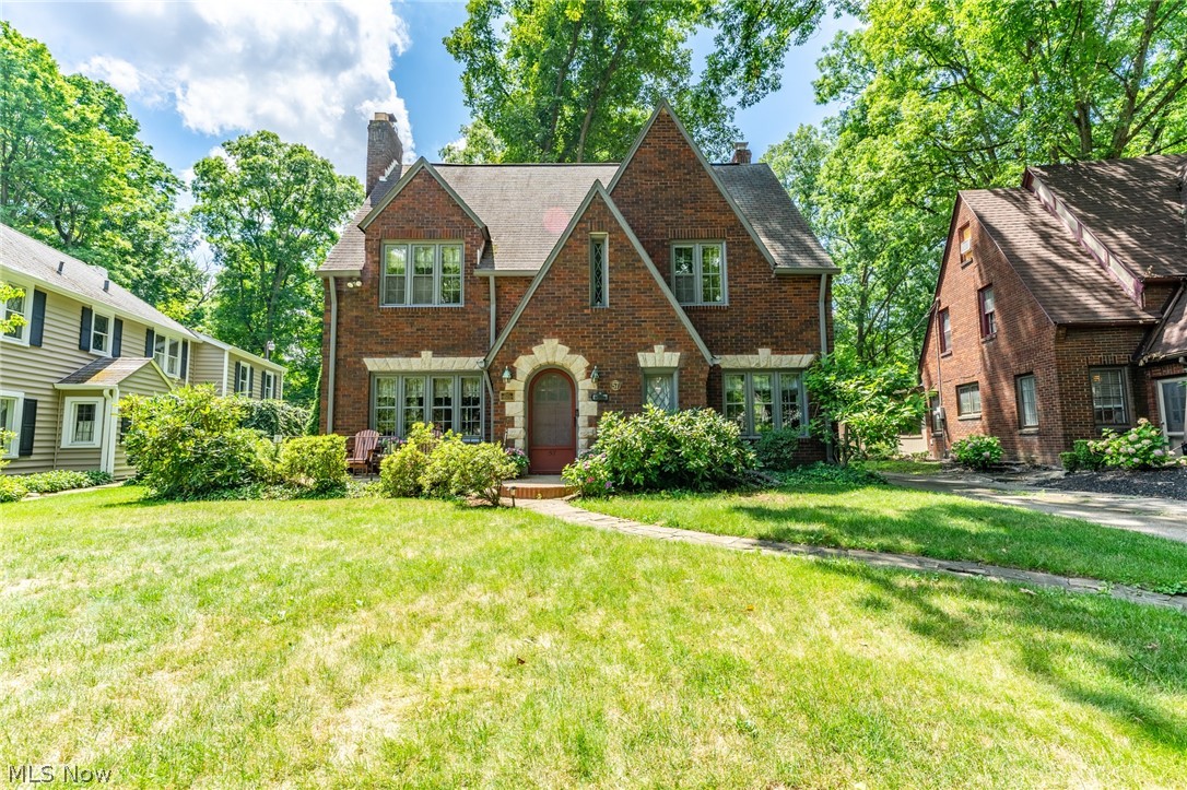 Welcome Home! This is a beautiful historic home on Jennette Drive. This house is perfect for your family and to start making many memories in each room of this lovely house!! As you walk up, you are greeted with wonderful brick conventional style house, custom round front door and a little area for the front porch! Walking in you will see all the hard wood features throughout from the doors to the floors and trim, the large living room is off the left side with a stone fireplace and a small office area in the back with an exit to the backyard. The dining room is cozy with plenty of space for the family and right off the eat in kitchen with a plenty of cabinet space and a breakfast nook ideal for the kids! 1/2 back near the backdoor. As you enter the second floor, an amazing custom window lights up the hallway to the 3 large bedrooms with great closet space in each bedroom. Updated full bathroom with ceramic tile, lots of space and storage. Basement has an area that's set up for another