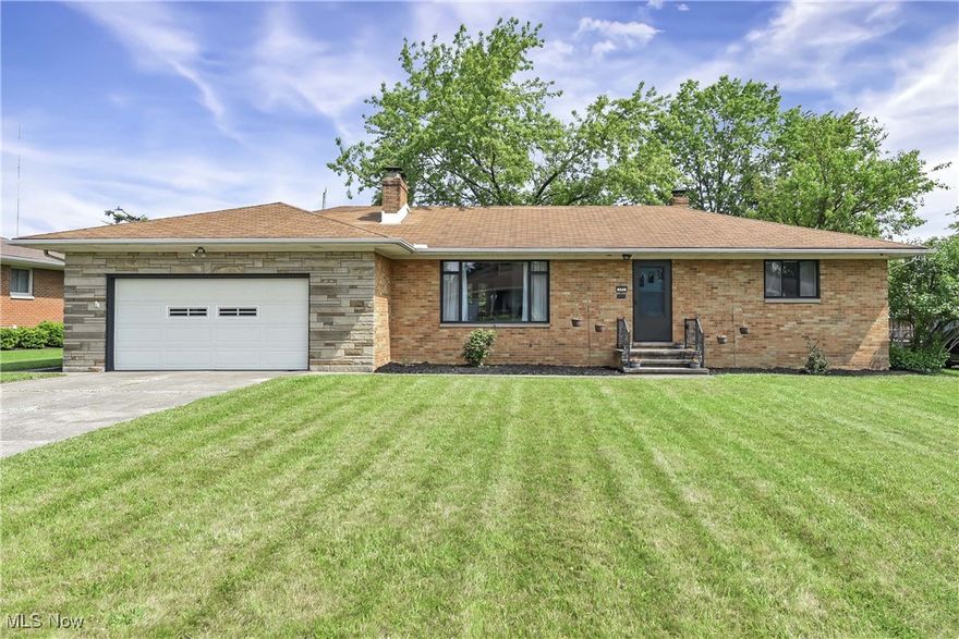 This stunning home, nestled on a tranquil side street, has been cared for by the same family since it was built in 1957. Justo Lane encompasses a welcoming sense of community and kindness among its residents. The home itself has been mindfully renovated with attention to the details, combining natural materials with sleek finishes. The reimagined kitchen is a showstopper, featuring custom live-edge wood countertops (durable Ash wood, zero maintenance, easy to clean), modern soft-close cabinetry, upper/under cabinet lights, single-basin black granite sink, porcelain tile floors, and stainless-steel appliances. Both bathrooms have also been fully updated with everything from new floors to painted ceilings. Throughout the house, the original hardwood floors have been rejuvenated along with all new light fixtures and fresh paint. The basement includes a large, freshly carpeted living space with a full bar and a second fireplace. Additional improvements include a new furnace, updated thermostat, newer garage door opener, and low-maintenance landscaping. Schedule your showing today to view this beautifully unique home.