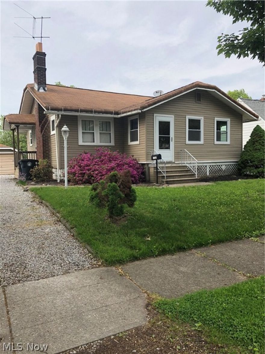 Do not miss this adorable 2 bedroom ranch close to park and shopping. Enjoy summer on the enclosed front porch. This home boasts an updated kitchen and bath, freshly painted interior, newer central air, and vinyl siding replaced in 2011. Seller replaced the water service line in 2018. In 2011 the fireplace had a new brick surround and hearth installed. All appliances including washer and dryer are included. Do not miss this home!
