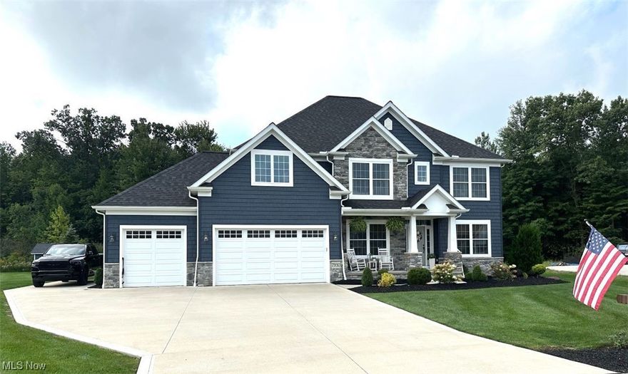 This home is a must see because it has too many extras to mention. French doors open to the living rm/den off the foyer. The dining room has a lighted tray ceiling and crown molding. Tons of cabinetry and counterspace in the bright, white kitchen, with a huge 12 x7 walk in pantry with custom shelving and a large island. The 2-story great room has a wall of windows with a 2-story stone fireplace. Upstairs are 4 large bedrooms. The large, main bedroom leads to a beautiful
main bath with a large walk-in closet with custom shelving, walk-in shower, soaking tub and vanity with double sinks. There is a partially finished basement with full bath and plenty of storage, Neat & Clean & Ready To Move in.