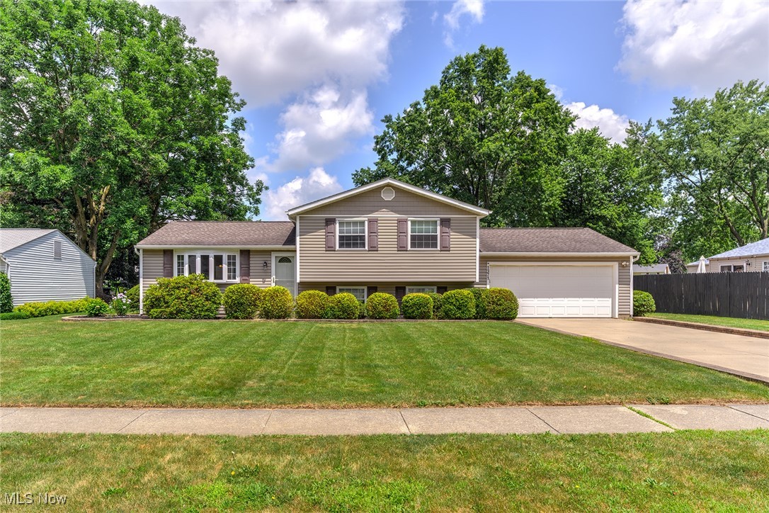 New Price! This well-cared-for 3-level split in the sought-after Seven Trails neighborhood is move-in ready and full of potential. Set on a quiet, sidewalk-lined street near parks, schools, shopping, and highways, this all-electric home blends comfort with convenience. Inside, you'll find 3 generously sized bedrooms, 1.5 baths, and great storage throughout. The oversized attached 2-car garage is perfect for vehicles, hobbies, or extra gear. With long-time owners who’ve maintained it with pride, this home is your chance to build equity in a great location. Don’t wait—schedule your showing today!