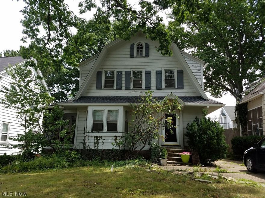 Bring this Lakewood Colonial on one of Lakewood's most desired streets back to it's beautiful self. 3 bedrooms with a finished third floor and a partially finished basement will give you give an abundance of space to roam. Plenty of natural light with a bay window and the alluring fireplace make the living room very warm and inviting! The beautiful hardwood floors, crown molding, and a French door that leads to the side patio are all a part of the charm. Some of the more recent updates include a complete roof tear off and replacement 4 years ago coupled with new gutters and downspouts, 4-year-old hot water tank, all new plumbing in the upstairs bathroom, and the fireplace is ready to go with a recent chimney sweep! There is also a detached 2.5 car garage with electricity and a fenced in yard if you have children or pets (or both!). Lots of value here with little elbow grease!