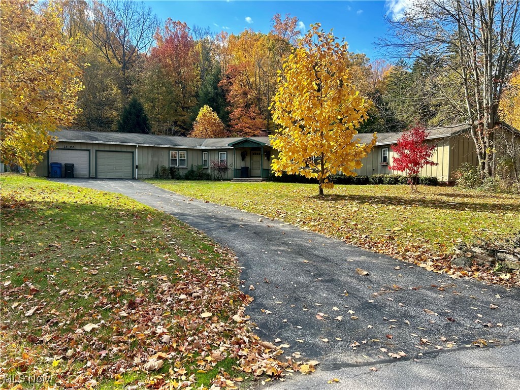 There is so much potential for this sprawling ranch on a parklike large over 2-acre lot in Willoughby Hills. Amazing views of the Chagrin River from your front yard make this setting a nature lovers dream. With over 2500 square feet this home has 3 bedrooms and 2 baths and a laundry room down the right-side wing of the home and the left wing of the home features another bedroom/office space, an additional family room space and another full bathroom with a large bonus area and another room which could be storage or a small office. The wooded large backyard has a large shed with garage door as well for additional storage and a patio off the kitchen area. With some TLC this home can be made to be your own. Do not hesitate to schedule your showing today this home won't last and is priced to sell!