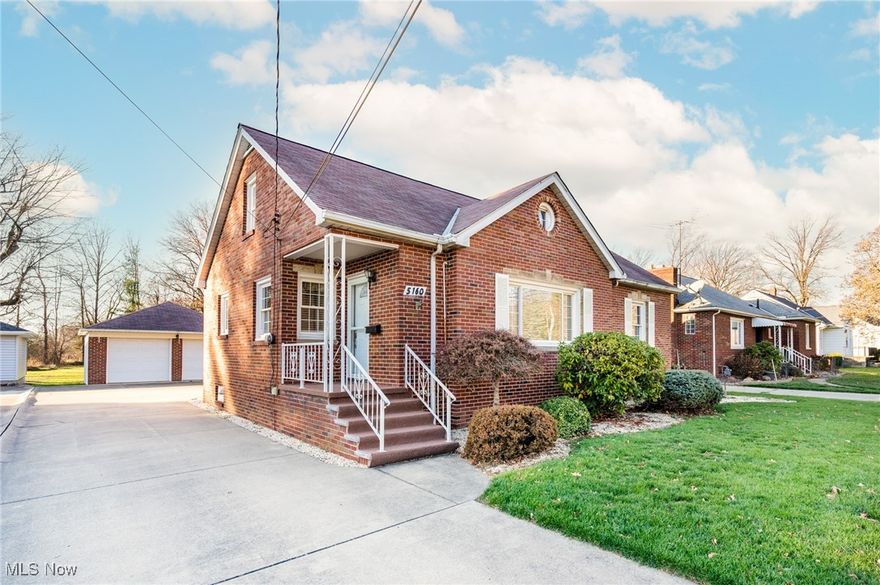 Don't miss this rare opportunity to acquire this custom brick home, which has been has been lovingly occupied, maintained, and updated by the same family ever since it was built.  In the Clearview School District, with easy access to Rt 2, schools, shopping, and services, the property features a 331 ft. deep lot, with plenty of room for play, picnics, gardening, entertaining and relaxation. The home has replacement windows and newer interior doors.  All kitchen and basement appliances stay, including the kitchen's gas range. This impeccably kept home offers a living room, dining room with built ins, two bedrooms and a full bath on the main floor.  The finished upstairs has plenty of storage, a bedroom area, and a half bath. The partially finished basement has a laundry area, a rec room, and even more storage, and a shower stall. Extra insulation was added through a Columbia Gas program. The two-car garage has two steel doors with garage door openers and a Nature Stone floor. The back porch also has Nature Stone. The extra cement pad offers a turnaround, extra parking, or boat or vehicle storage. The front porch has newer indoor/outdoor carpet. A lawn sprinkler system hasn't been used in a couple of years.  If you are looking for a home in move-in condition with a good-sized yard you will want to tour this home.