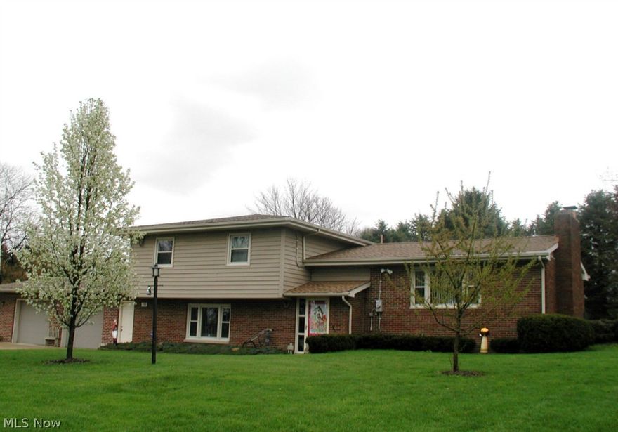 Beautifully shrubbed and landscaped grounds are a fitting introduction to a superb home!!  This 3 bedroom, 2 bath home is the perfect property waiting for you.  Large family room is highlighted by a gas fireplace and built-in desk for your office.  You'll love the well-designed kitchen w/eating bar.  Cheerful dining room has plenty of room for family gatherings & walk-out to a patio.  The brick fireplace adds a cozy touch to the formal living room.  Nice size bedrooms accompany the second-floor. A whole house generator was added for convenience.  The overall home has been completely updated.  Entertain on your large private patio.  Home warranty is also provided for you!!  Turn key!   All mineral rights and oil and gas lease transfer to buyers.