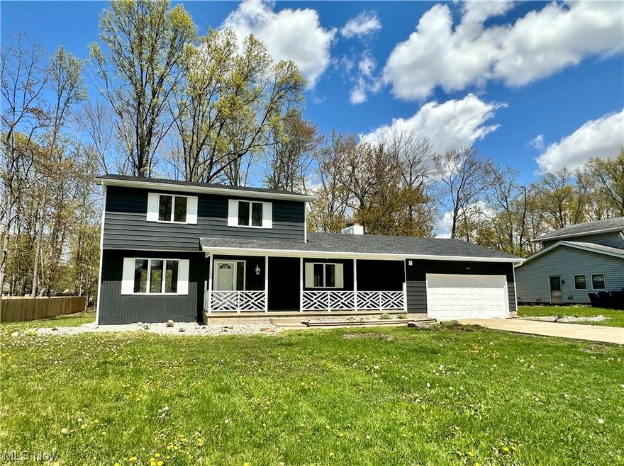 What do you get when you combine space, style, location, and livability? 9051 Cain Drive, of course! Situated on a roomy 0.61 acre lot on a quiet street in a terrific Howland neighborhood, this 2,500+ square foot home offers everything you've been searching for and then some. First floor highlights include a step-down living room, dining room, nicely-updated open kitchen with gas fireplace, laundry room, half-bath, and a beautiful great room addition with vaulted ceiling, skylights, and walls of windows. The second floor features a primary bedroom with en suite bath and large closet, plus two additional bedrooms and a guest bath. If you need a home with space to live and grow, this is it! All the rooms are oversized and airy with neutral wall colors and the same flooring for a seamless, open feel. Other notables include: Full basement, two-car garage, nice front porch, large backyard and a freshly-painted exterior for optimal curb appeal.