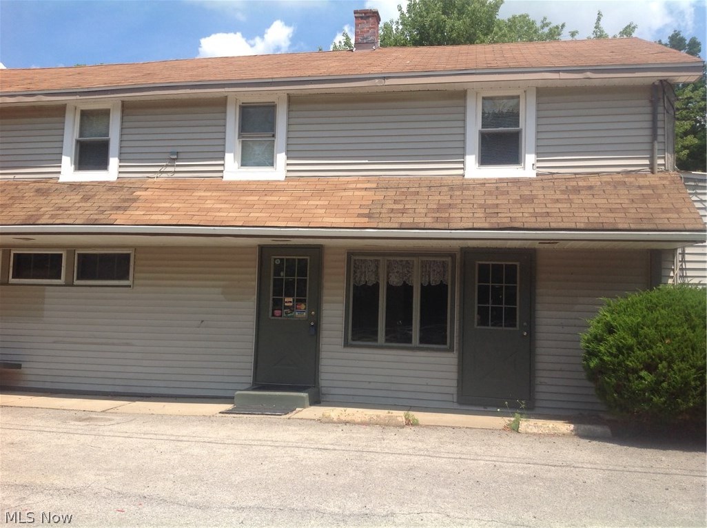 Ready to invest!!! Great for /car lot, mechanic,towing company,scrapyard and other business. Property also offers second floor apartment on top of garage sitting on 1.5 acres. Land contract terms available!! 15,000 down 432.45 a month plus taxes and insurance 5 year land contract. Call today for a showing!!!